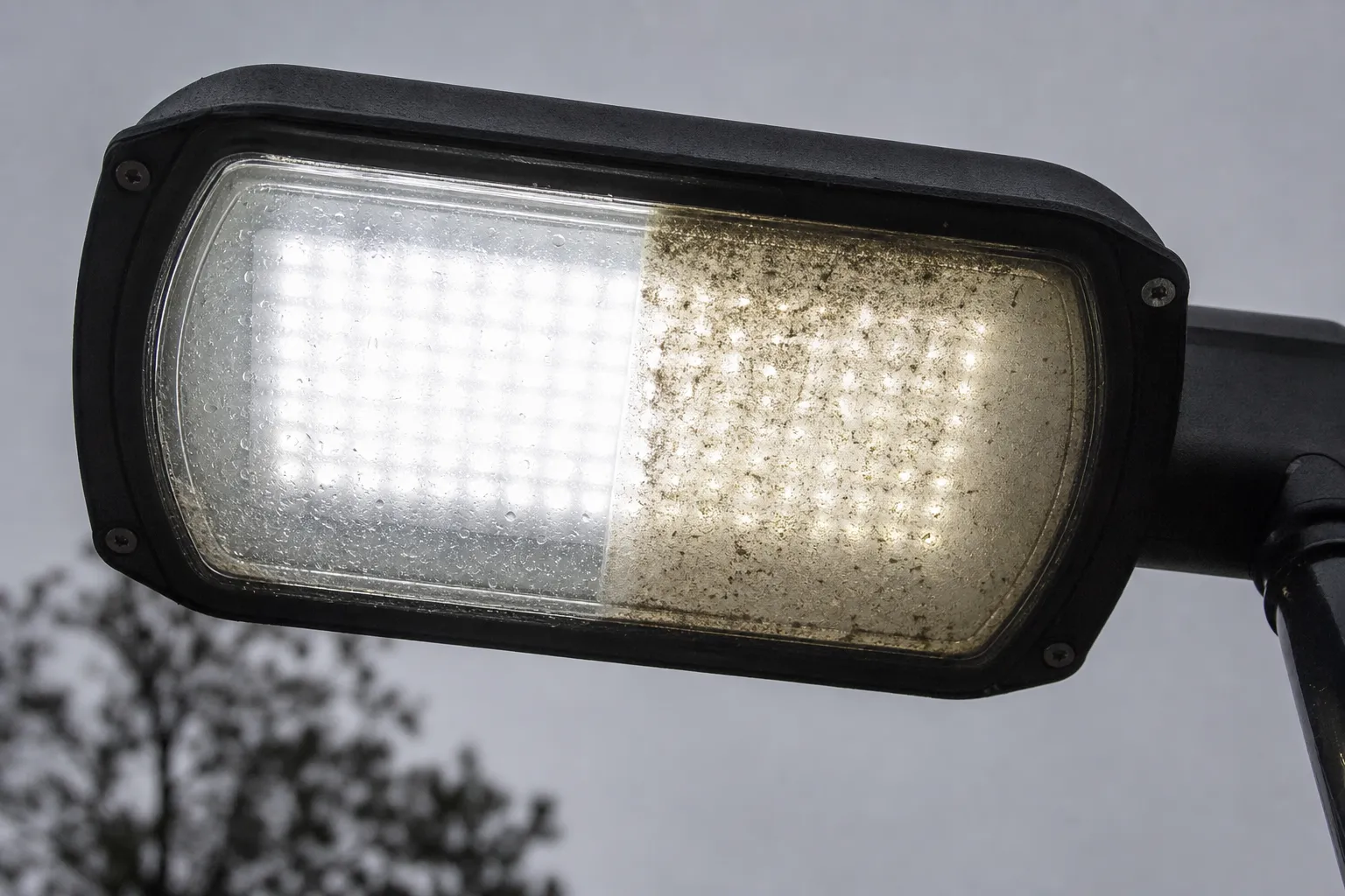 How much light loss will be caused by dirt on the surface of street luminaire glass cover?