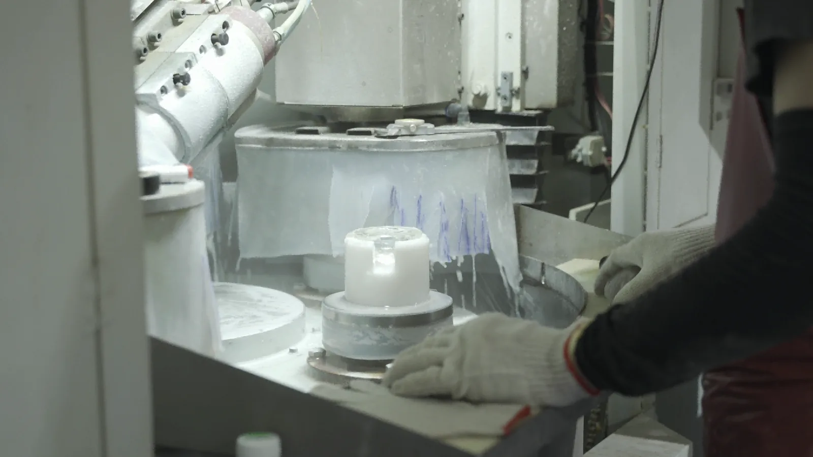 Optical glass component undergoing a controlled finishing operation at BO-Glass