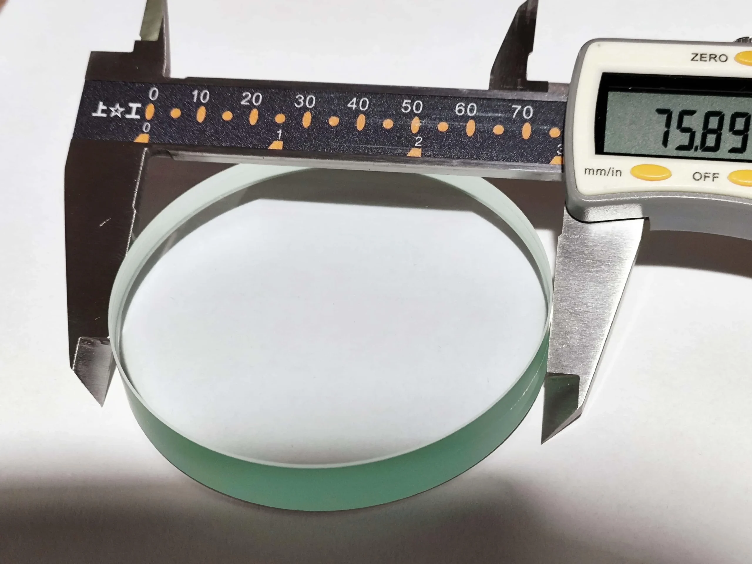 Caliper inspection of a curved glass component after edge processing