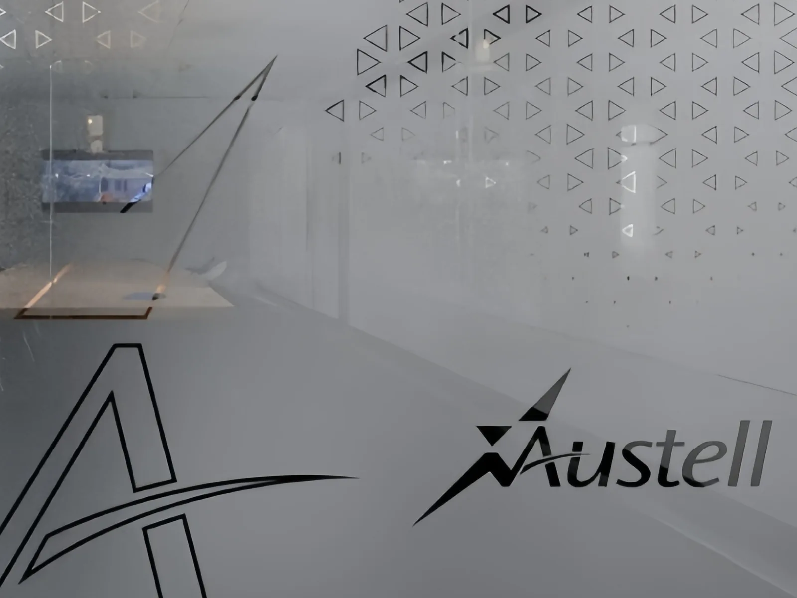 Decorative glass combining a frosted appearance with printed graphics.