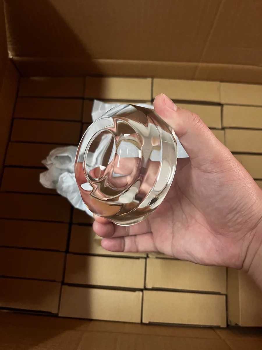 Custom thick pressed glass lens with curved optical surfaces