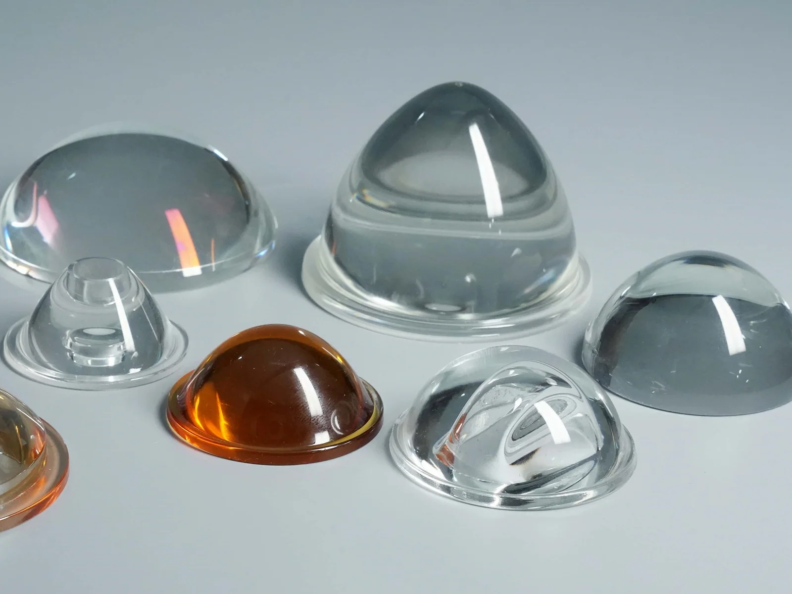 Domed glass components with different heights, diameters and flanged profiles