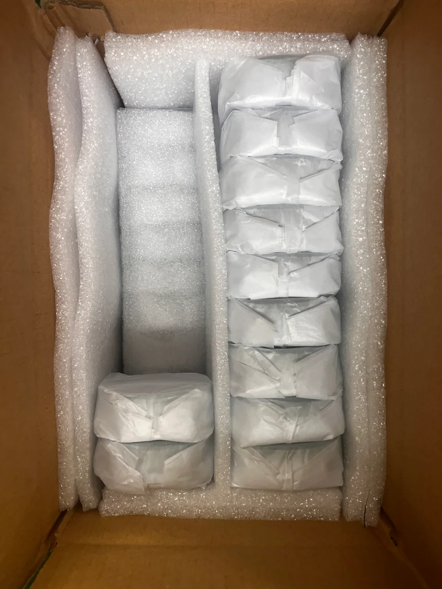 Individually wrapped components arranged with foam protection inside a carton