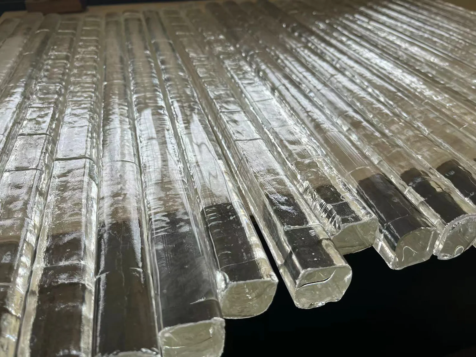 Clear optical glass rod stock used to prepare lens blanks and preforms