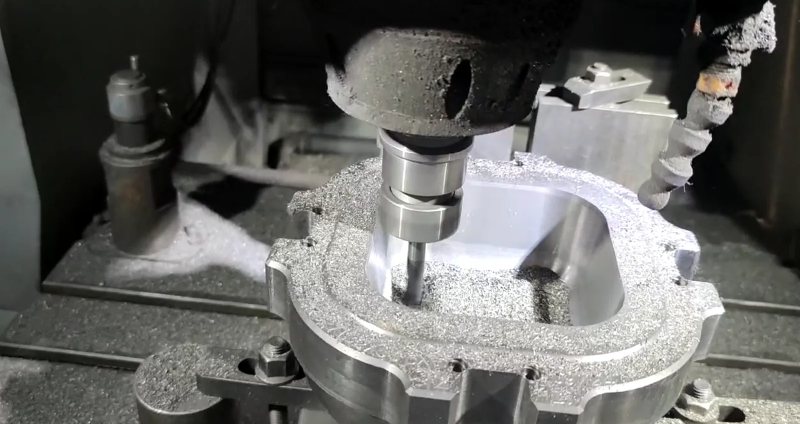 A milling cutter machining the cavity of a metal mold