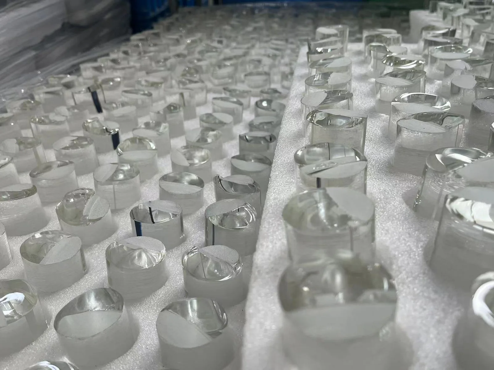 Prepared glass lens blanks arranged in protective foam trays