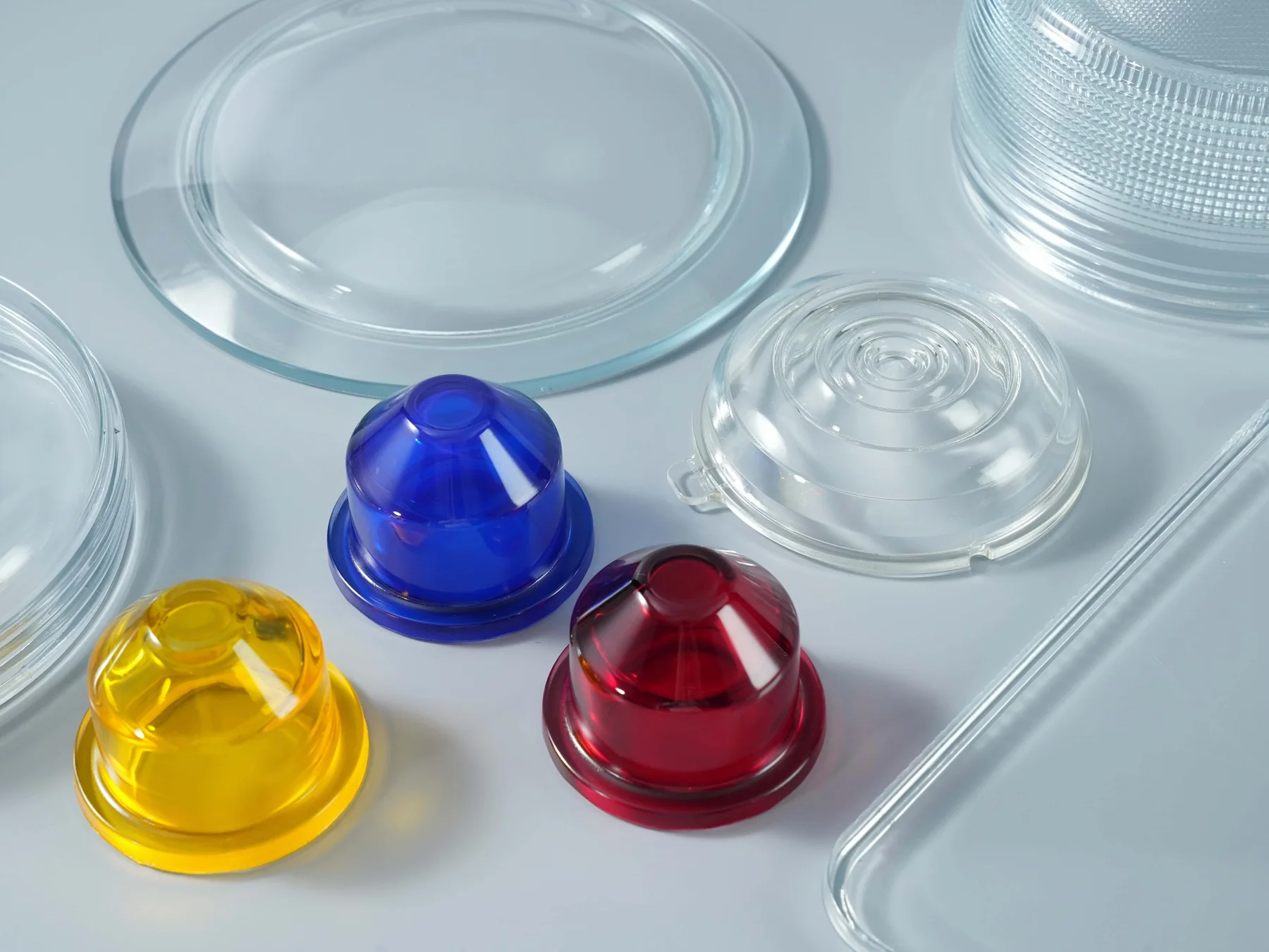 Clear and coloured glass covers, flat rims and patterned glass components