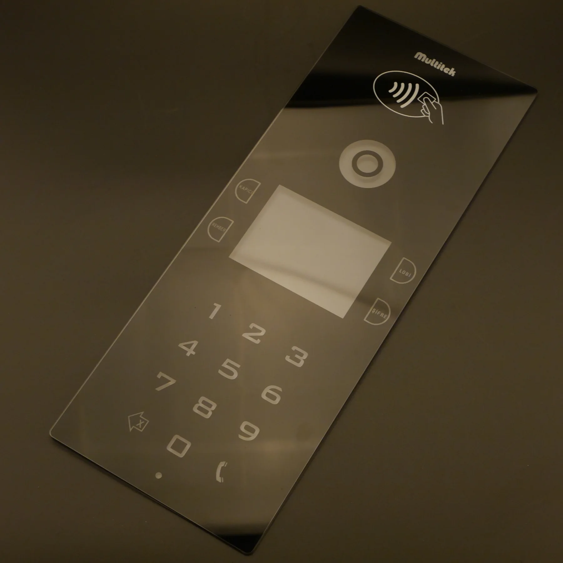 Real metallic-silver printing on tinted cover glass; effect pigments need a dedicated appearance standard.