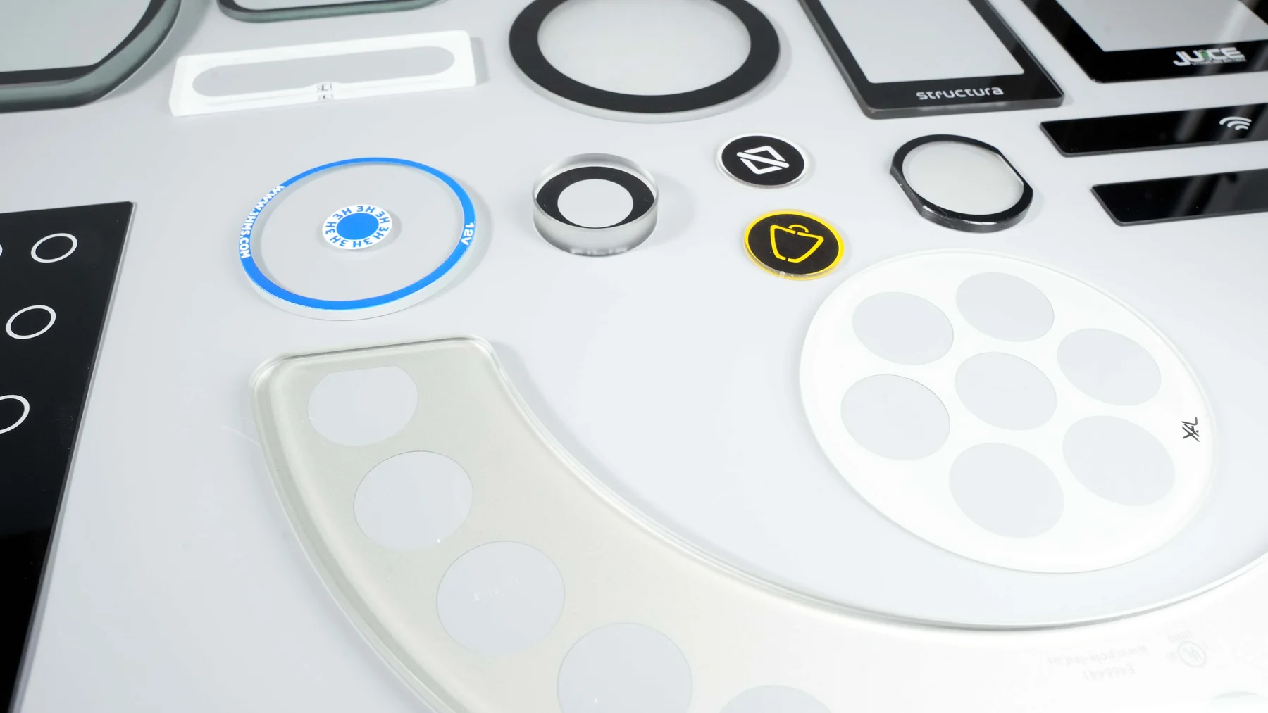 Real screen-printed control-panel, instrument, appliance and shaped-glass product examples.